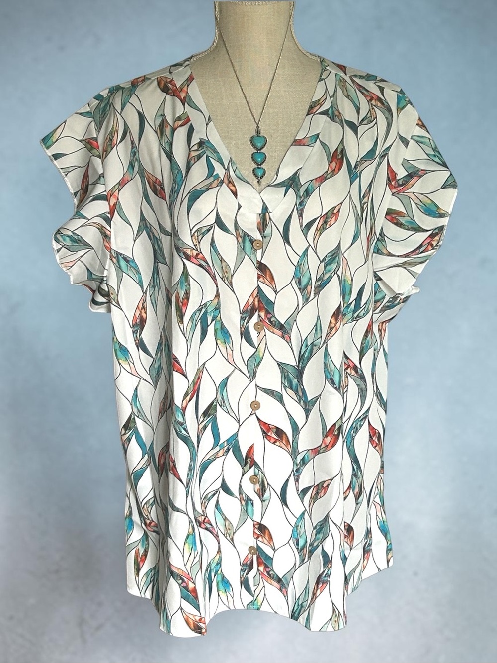 White short sleeve V-neck blouse colorful botanical leaf pattern Ruffle sleeves